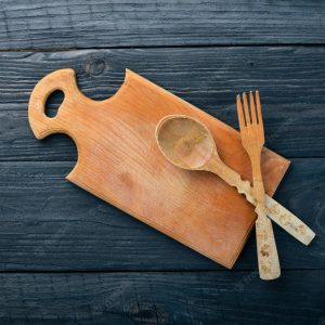 wooden-spoons-forks-shovels-wooden-background-top-view-free-space-your-text_187166-21890